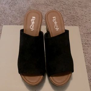 Black suede open toe slip on clog mule